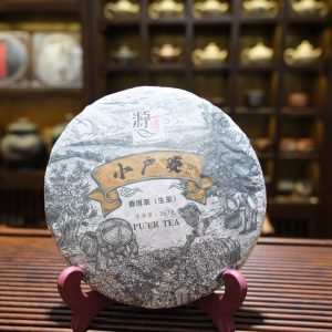 Trà Phổ Nhĩ Sống Năm 2015 Tiểu Hộ Trại Vùng Lâm Thương 357gam Giá Gốc